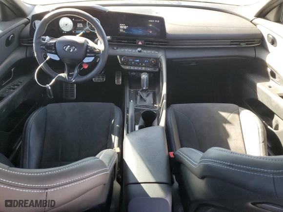 2023 Hyundai Elantra N with VIN KMHLW4AK1PU011784, listed as a Copart auction lot 72767504 with 30,485 mi miles and Salvage Title. Bid and sale history available at carsss.com. Image 8.