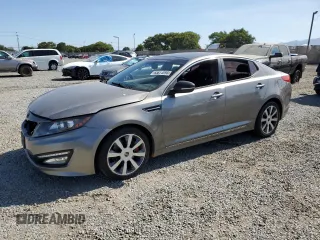 2013 Kia Optima SX with VIN 5XXGR4A63DG152535, listed as a Copart auction lot 63614895 with 172,394 mi miles and Salvage title. Bid and sale history available at DreamBid. Image 1.
