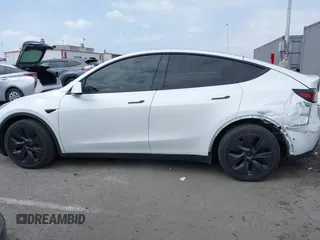 2021 Tesla Model Y Long Range with VIN 5YJYGDEE3MF081304, listed as a IAAI auction lot 42119270 with 90,521 mi miles. Bid and sale history available at carsss.com. Image 14.