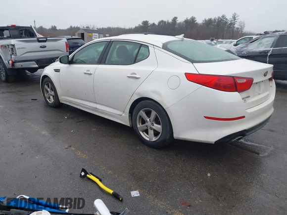 2015 Kia Optima LX with VIN KNAGM4A70F5571034, listed as a IAAI auction lot 41734211 with 214,948 mi miles. Bid and sale history available at carsss.com. Image 3.