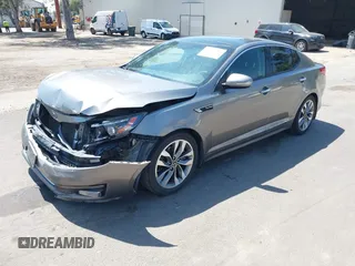 2014 Kia Optima SXL Turbo with VIN 5XXGR4A66EG301327, listed as a IAAI auction lot 41978246 with 140,107 mi miles and . Bid and sale history available at DreamBid. Image 2.