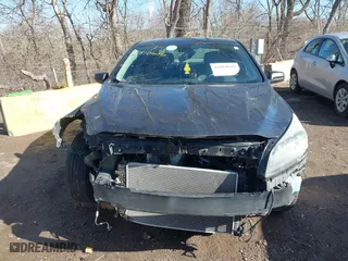 2015 Chevrolet Malibu LS with VIN 1G11A5SL1FF118417, listed as a IAAI auction lot 41810616 with 199,831 mi miles. Bid and sale history available at carsss.com. Image 13.