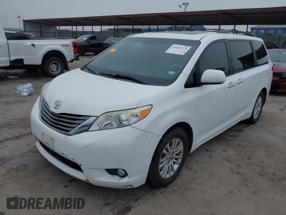 2014 Toyota Sienna XLE z VIN 5TDYK3DC5ES439511, wystawiony jako IAAI lot #41510779 z przebiegiem 218 782 mil mil oraz . Historia ofert i sprzedaży dostępna na DreamBid. Obrazek 19.