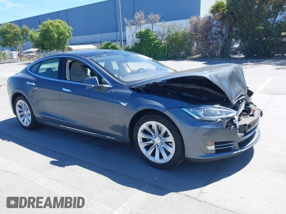 2014 Tesla Model S 60 z VIN 5YJSA1H17EFP33910, wystawiony jako IAAI lot #42346934 z przebiegiem Nie podano mil oraz . Historia ofert i sprzedaży dostępna na DreamBid. Obrazek 1.