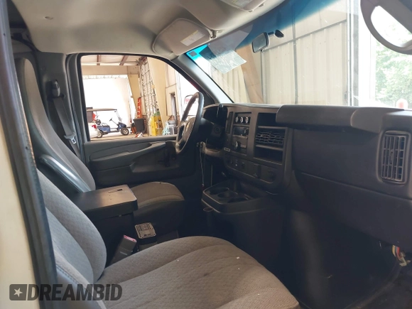2015 Chevrolet Express Cargo with VIN 1GCWGFCF9F1283932, listed as a IAAI auction lot 42529084 with 188,967 mi miles and . Bid and sale history available at DreamBid. Image 5.