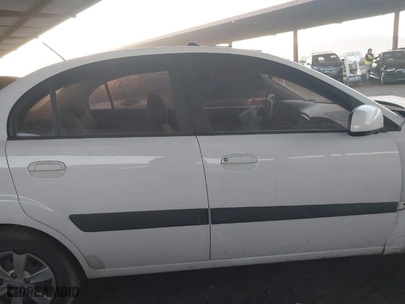 2009 Kia Rio with VIN KNADE223396568496, listed as a IAAI auction lot 41357082 with NaN miles. Bid and sale history available at carsss.com. Image 13.