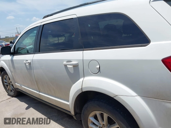 2017 Dodge Journey SXT z VIN 3C4PDCBG4HT590992, wystawiony jako IAAI lot #42378549 z przebiegiem 275 884 mil mil oraz . Historia ofert i sprzedaży dostępna na DreamBid. Obrazek 14.