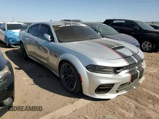 2020 Dodge Charger Scat Pack Widebody z VIN 2C3CDXGJ6LH185703, wystawiony jako Copart lot #52411985 z przebiegiem 47 136 mil mil oraz Szkoda całkowita • Salvage title. Historia ofert i sprzedaży dostępna na DreamBid. Obrazek 11.