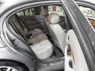 2005 Jaguar S-Type with VIN SAJWA01T85FN43991, listed as a IAAI auction lot 42055271 with 114,454 mi miles and . Bid and sale history available at DreamBid. Image 8.