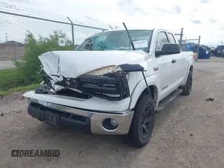 2012 Toyota Tundra with VIN 5TFUW5F16CX225421, listed as a IAAI auction lot 42210783 with 207,025 mi miles and . Bid and sale history available at DreamBid. Image 2.