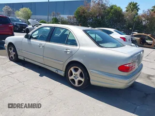 2001 Mercedes-Benz E-Class with VIN WDBJF65J81B314801, listed as a IAAI auction lot 41949755 with 254,836 mi miles. Bid and sale history available at carsss.com. Image 3.