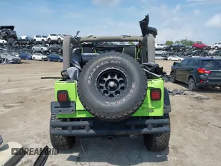 2004 Jeep Wrangler Sahara z VIN 1J4FA59S44P704878, wystawiony jako IAAI lot #42226255 z przebiegiem 88 886 mil mil oraz . Historia ofert i sprzedaży dostępna na DreamBid. Obrazek 17.