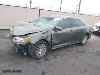 2014 Toyota Camry Hybrid LE with VIN 4T1BD1FK2EU134838, listed as a IAAI auction lot 41912000 with 132,000 mi miles. Bid and sale history available at carsss.com. Image 17.