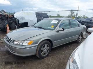 2001 Toyota Camry CE z VIN JT2BG22K410587070, wystawiony jako IAAI lot #42388043 z przebiegiem 119 183 mil mil oraz . Historia ofert i sprzedaży dostępna na DreamBid. Obrazek 2.