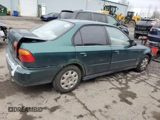 1999 Honda Civic VP z VIN 2HGEJ6612XH519340, wystawiony jako Copart lot #45510895 z przebiegiem 192 955 mil mil oraz Szkoda całkowita • Salvage title. Historia ofert i sprzedaży dostępna na DreamBid. Obrazek 3.