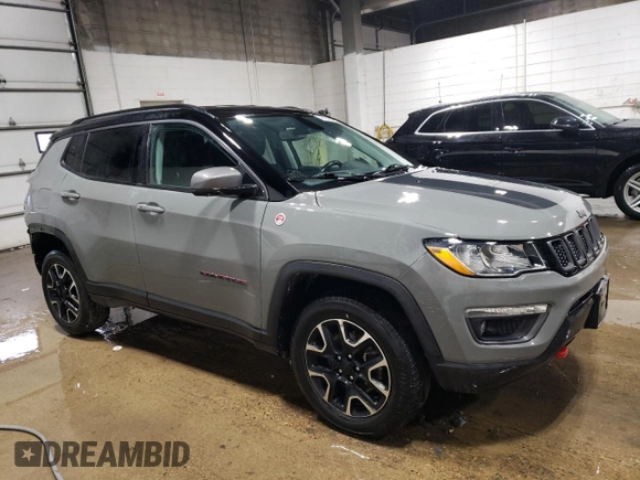 2020 Jeep Compass Trailhawk with VIN 3C4NJDDB0LT215553, listed as a Copart auction lot 45045165 with 90,702 mi miles and Salvage Title. Bid and sale history available at carsss.com. Image 4.
