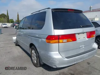2004 Honda Odyssey EX with VIN 5FNRL18684B143038, listed as a IAAI auction lot 42083469 with 160,317 mi miles and . Bid and sale history available at DreamBid. Image 3.