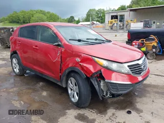 2012 Kia Sportage LX with VIN KNDPB3A23C7311640, listed as a IAAI auction lot 42258206 with 220,000 mi miles and . Bid and sale history available at DreamBid. Image 1.
