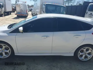 2014 Ford Focus ST with VIN 1FADP3L99EL311771, listed as a IAAI auction lot 41419521 with 124,572 mi miles and . Bid and sale history available at carsss.com. Image 15.