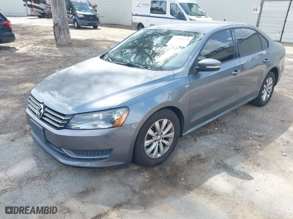 2014 Volkswagen Passat Wolfsburg Ed with VIN 1VWAT7A39EC109525, listed as a IAAI auction lot 41919773 with 133,510 mi miles. Bid and sale history available at carsss.com. Image 2.