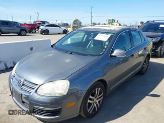 2005 Volkswagen Jetta z VIN 3VWDG71K35M613236, wystawiony jako IAAI lot #41764835 z przebiegiem Nie podano mil oraz . Historia ofert i sprzedaży dostępna na DreamBid. Obrazek 6.