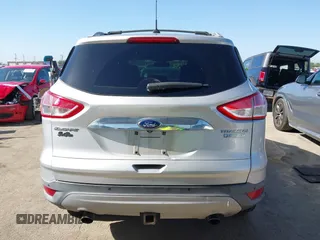 2015 Ford Escape Titanium with VIN 1FMCU0J90FUA43720, listed as a IAAI auction lot 42541048 with 98,948 mi miles and . Bid and sale history available at DreamBid. Image 16.