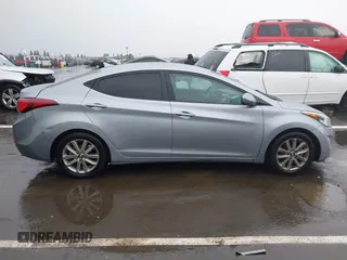 2015 Hyundai Elantra SE z VIN 5NPDH4AE7FH616818, wystawiony jako IAAI lot #41784684 z przebiegiem 107 377 mil mil oraz . Historia ofert i sprzedaży dostępna na DreamBid. Obrazek 13.