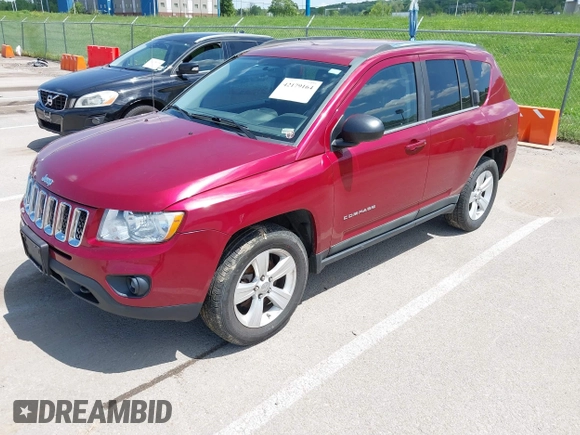 2011 Jeep Compass Latitude with VIN 1J4NF1FB3BD154601, listed as a IAAI auction lot 42179164 with 146,903 mi miles and . Bid and sale history available at DreamBid. Image 2.