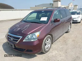2007 Honda Odyssey EX-L with VIN 5FNRL38727B063324, listed as a IAAI auction lot 41921114 with 199,533 mi miles. Bid and sale history available at carsss.com. Image 2.