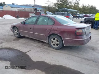2001 Pontiac Bonneville SE z VIN 1G2HX54K914293726, wystawiony jako IAAI lot #41373612 z przebiegiem 120 117 mil mil oraz . Historia ofert i sprzedaży dostępna na DreamBid. Obrazek 3.