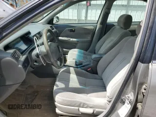 2000 Toyota Camry CE z VIN 4T1BG22K5YU013891, wystawiony jako Copart lot #56693255 z przebiegiem 248 922 mil mil oraz Szkoda całkowita • Salvage title. Historia ofert i sprzedaży dostępna na DreamBid. Obrazek 7.