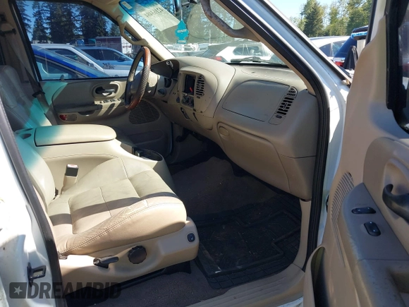 2001 Ford F-150 XLT with VIN 1FTRW08L21KC01442, listed as a IAAI auction lot 42163484 with 230,590 mi miles and . Bid and sale history available at DreamBid. Image 5.