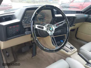 1986 BMW 6 Series 635CSi with VIN WBAEC840XG0613529, listed as a IAAI auction lot 42060435 with 1 mi miles. Bid and sale history available at carsss.com. Image 16.
