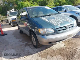 2000 Toyota Sienna LE with VIN 4T3ZF13C5YU217679, listed as a IAAI auction lot 42005053 with 198,953 mi miles. Bid and sale history available at carsss.com. Image 1.