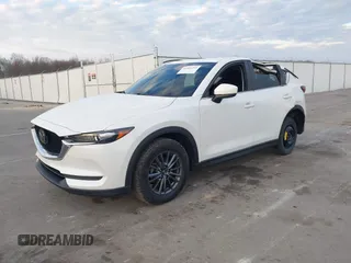 2019 Mazda CX-5 Sport with VIN JM3KFABMXK1655302, listed as a IAAI auction lot 41901293 with 140,369 mi miles and . Bid and sale history available at DreamBid. Image 2.
