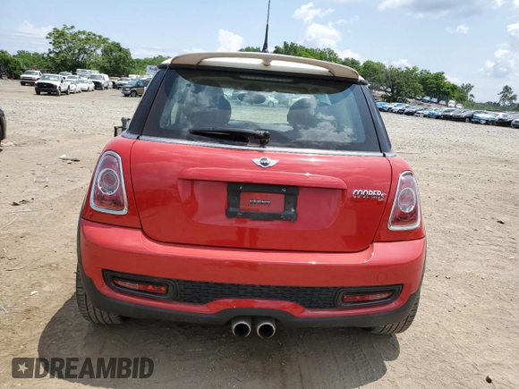 2013 MINI Hardtop S with VIN WMWSV3C59DT479278, listed as a Copart auction lot 60031535 with 82,166 mi miles and Salvage title. Bid and sale history available at DreamBid. Image 6.