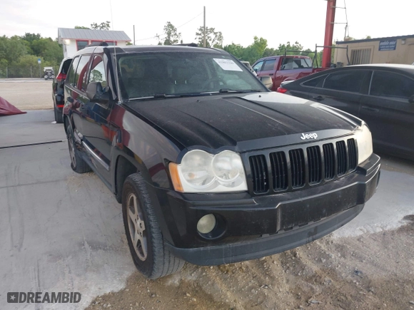 2005 Jeep Grand Cherokee Laredo with VIN 1J4HR48N75C647740, listed as a IAAI auction lot 41803160 with 145,147 mi miles. Bid and sale history available at carsss.com. Image 1.