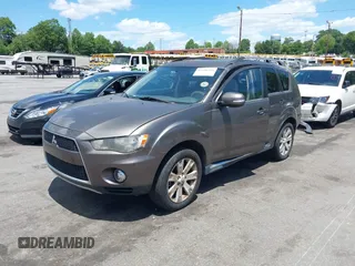 2012 Mitsubishi Outlander SE z VIN JA4AS3AW7CU014570, wystawiony jako IAAI lot #42340449 z przebiegiem 116 127 mil mil oraz . Historia ofert i sprzedaży dostępna na DreamBid. Obrazek 2.