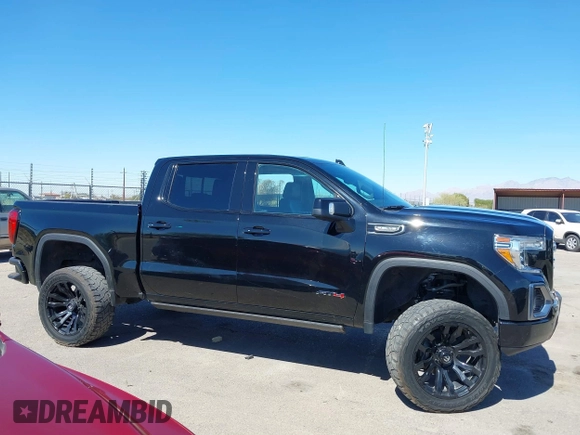 2021 GMC Sierra 1500 AT4 with VIN 3GTP9EED5MG206008, listed as a IAAI auction lot 41665423 with 61,685 mi miles. Bid and sale history available at carsss.com. Image 14.