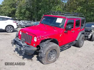2016 Jeep Wrangler Unlimited Rubicon with VIN 1C4HJWFG7GL128994, listed as a IAAI auction lot 40503403 with 85,950 mi miles. Bid and sale history available at carsss.com. Image 19.