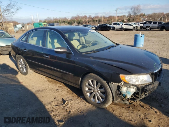2009 Hyundai Azera Limited z VIN KMHFC46F79A341743, wystawiony jako Copart lot #83299354 z przebiegiem 98 779 mil mil oraz Szkoda całkowita • Salvage title. Historia ofert i sprzedaży dostępna na DreamBid. Obrazek 4.