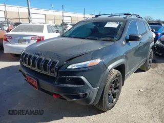 2017 Jeep Cherokee Trailhawk L Plus with VIN 1C4PJMBBXHW634944, listed as a IAAI auction lot 41022673 with 116,542 mi miles. Bid and sale history available at carsss.com. Image 18.