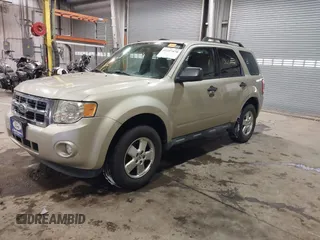 2011 Ford Escape XLT with VIN 1FMCU0D75BKB11168, listed as a IAAI auction lot 41327470 with 136,610 mi miles. Bid and sale history available at carsss.com. Image 2.