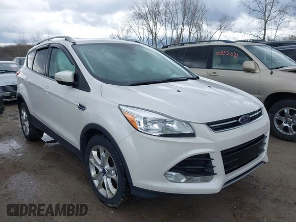2016 Ford Escape Titanium with VIN 1FMCU9JX9GUA62674, listed as a IAAI auction lot 41838996 with 135,105 mi miles. Bid and sale history available at carsss.com. Image 1.