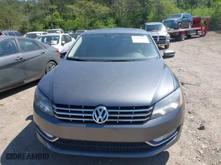2013 Volkswagen Passat SEL Premium with VIN 1VWCM7A34DC055684, listed as a IAAI auction lot 42039636 with 167,746 mi miles. Bid and sale history available at carsss.com. Image 6.