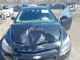 2012 Chevrolet Malibu 1LS with VIN 1G1ZB5E04CF180746, listed as a IAAI auction lot 41866051 with 140,002 mi miles and . Bid and sale history available at DreamBid. Image 10.