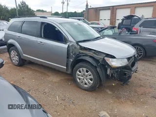 2019 Dodge Journey SE z VIN 3C4PDCBG1KT701313, wystawiony jako IAAI lot #42302555 z przebiegiem 71 792 mil mil oraz . Historia ofert i sprzedaży dostępna na DreamBid. Obrazek 1.