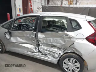 2016 Honda Fit LX with VIN JHMGK5H57GX008358, listed as a IAAI auction lot 42473358 with 43,158 mi miles and . Bid and sale history available at DreamBid. Image 6.