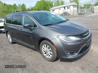 2017 Chrysler Pacifica Touring L with VIN 2C4RC1BG5HR705277, listed as a IAAI auction lot 42230036 with 75,287 mi miles and . Bid and sale history available at DreamBid. Image 1.