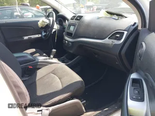 2013 Dodge Journey SXT with VIN 3C4PDCBG0DT701712, listed as a IAAI auction lot 42015263 with 92,533 mi miles. Bid and sale history available at carsss.com. Image 5.